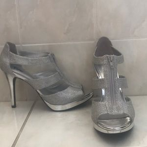 Woman’s silver heels